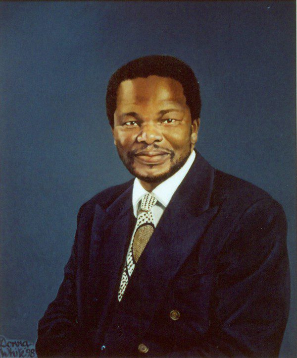 Reuel Khoza shown on a living room wall